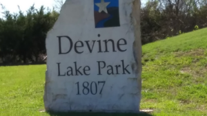 Sign at entrance to Devine Lake Park Leander TX